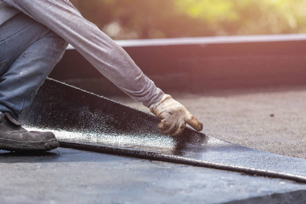 Professional Waterproofing technician working in Leicester, NY